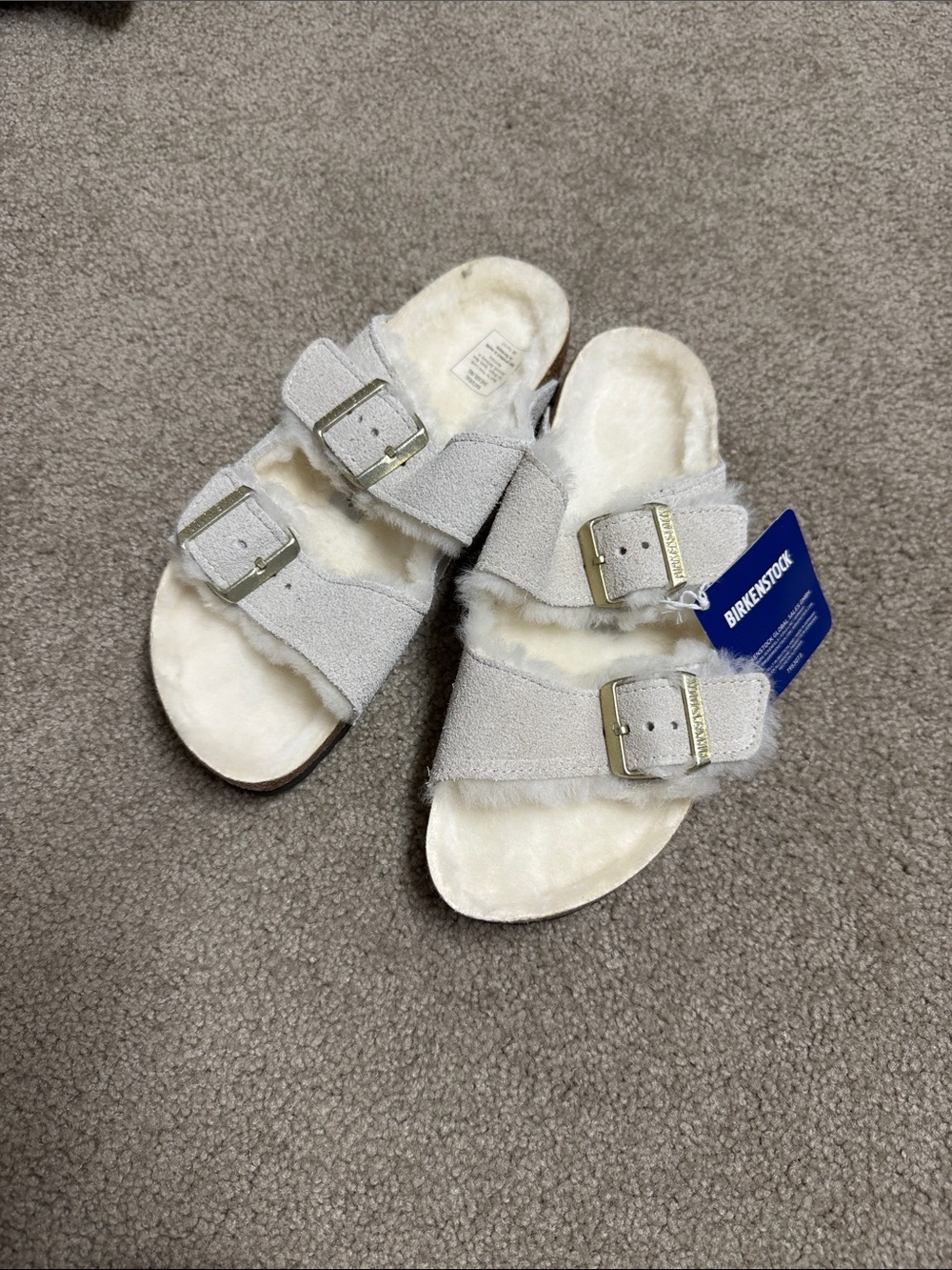 Birkenstock Arizona Shearling Slides in Light Gray with Gold Buckles